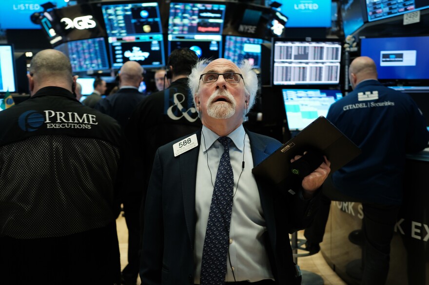 Stock trader Peter Tuchman works on the floor of the New York Stock Exchange on March 9, 2020.