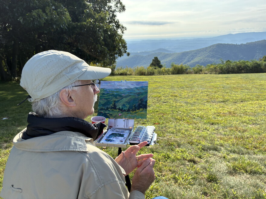 David Dorrell of New Jersey paints a landscape from Rocky Knob during the 2026 Floyd Plein Air Biennial.