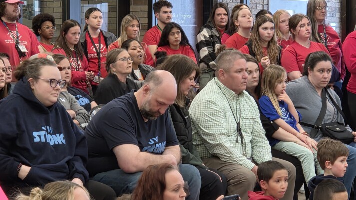 J.W. Smith Principal Bruce Goodwin, shown here in a green checkered shirt, awaits a decision to close the school during a special meeting of Bemidji Area Schools on March 30, 2026.