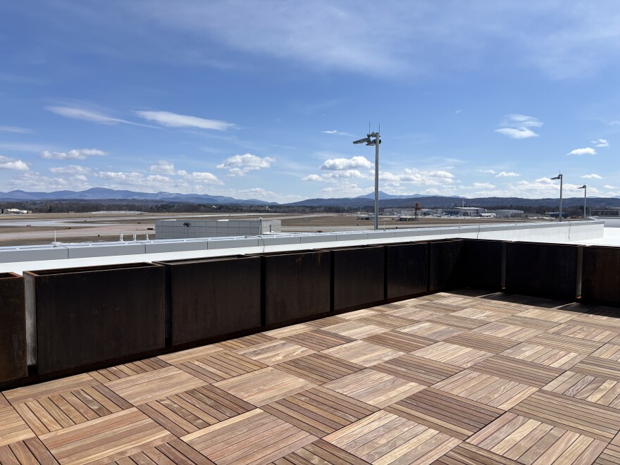 An outdoor area with a view of airport runways