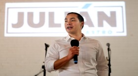 Democratic presidential candiate Julian Castro talks to supporters at a fundraiser at Native Hostel in East Austin on Wednesday.