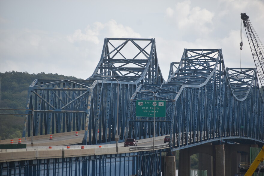  Work on the McClugage Bridge seen in a 2021 file photo. Preparations for demolishing the eastbound span and constructing a new span of the bridge continue this year. The project is expected to wrap up in fall 2023. 