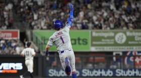 New York Mets' Jeff McNeil celebrates while running to second base after hitting a two-run home run, leading to Pete Alonso scoring, during the sixth inning of a baseball game against the New York Yankees, Tuesday, July 23, 2024, in New York. (AP Photo/Pamela Smith)