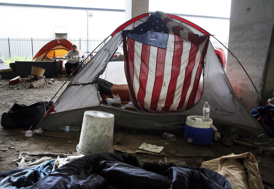 Personal belongings of a homeless person, including an American flag, in Dallas, Sept. 10, 2016