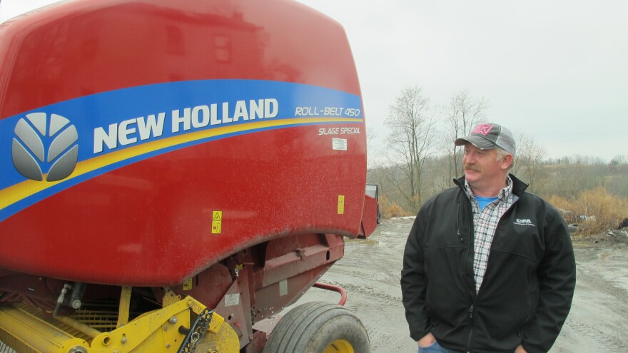 Dairy farmer Charlie Clark bought a new hay baler with the royalties he received from natural gas development on his land.