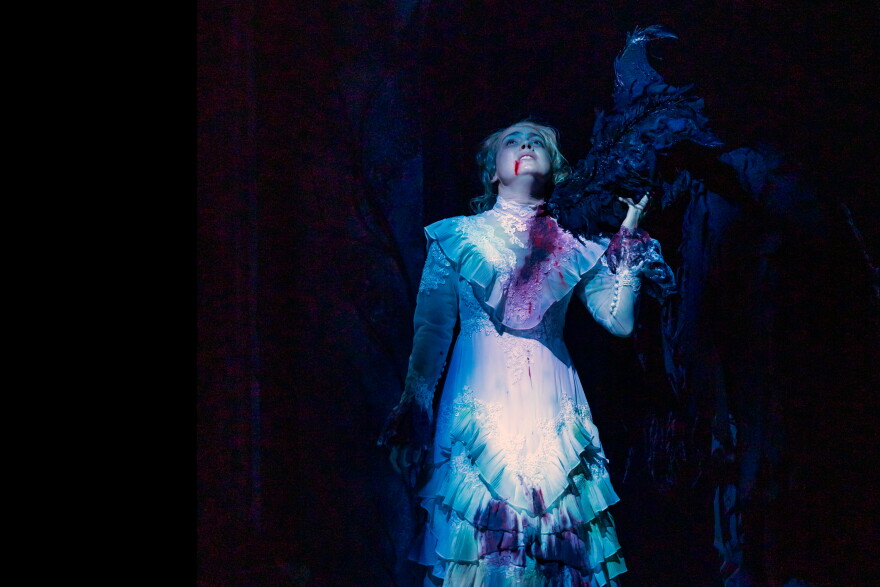 Already bloodied Lucy, played by Scout Backus, is bitten in Hartford Stage’s ‘Dracula.’