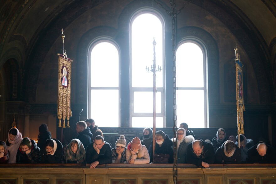 A service at the Church of St. George in Lviv, Ukraine, is packed with worshipers praying for Ukraine on Sunday.