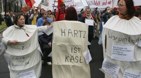 Marchers demonstrate against the German labor reforms, known as Hartz IV. (November 5, 2005)