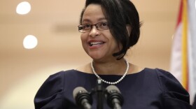 Renatha Francis smiles as she speaks during a news conference, Tuesday, May 26, 2020, at the Miami-Dade Public Library in Miami. Gov. Ron DeSantis appointed two South Floridians to the state Supreme Court on Tuesday: Francis, a Palm Beach County circuit judge who immigrated from Jamaica and, a former assistant U.S. attorney who is the son of Cuban immigrants. (AP Photo/Wilfredo Lee)