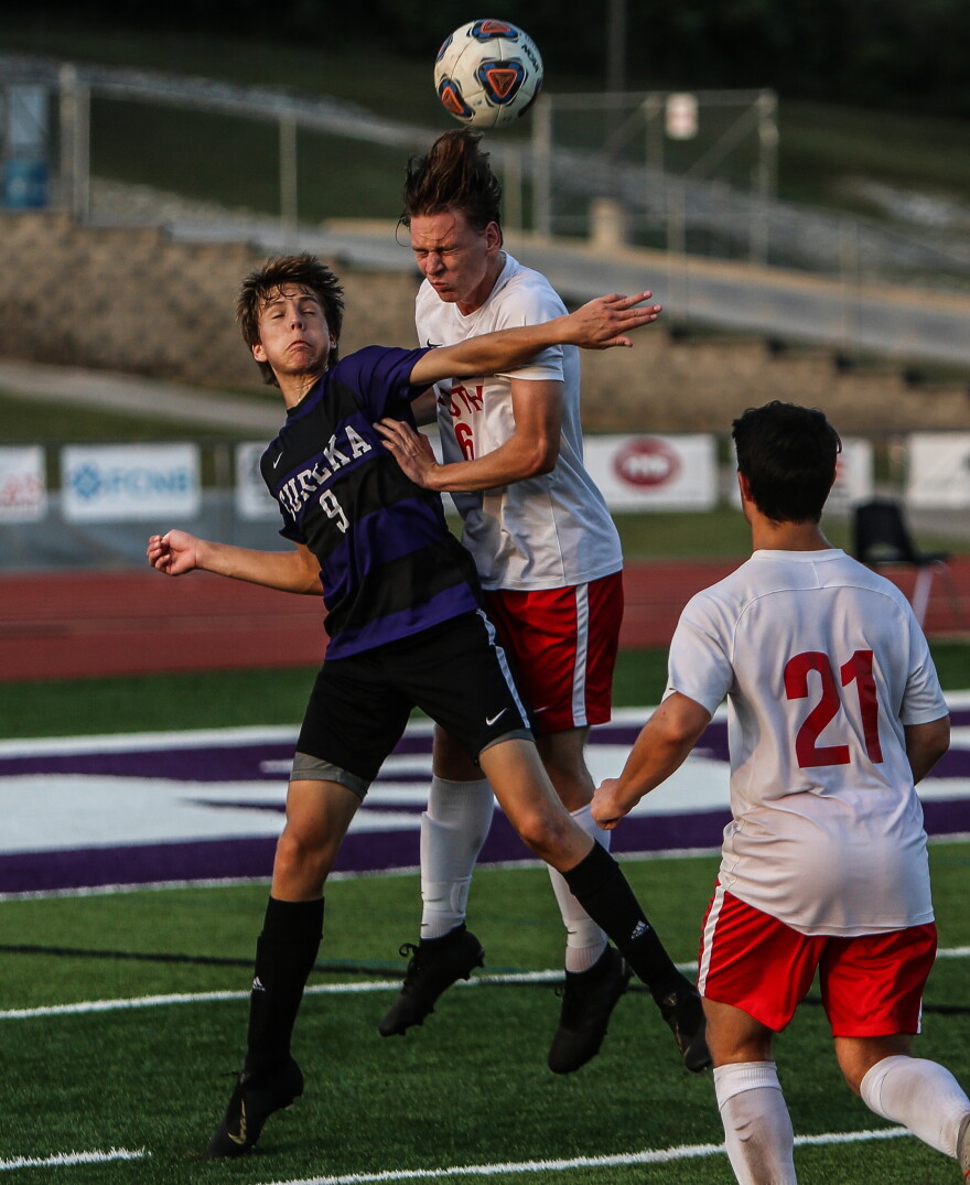 BEST ACTION SHOT - A Eureka High School varsity soccer player (left) bumps heads with a Fort Zumwalt South varsity soccer player after battling to get the ball in the air during the teams' matchup, Sept. 18.