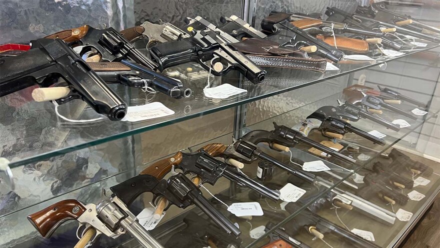 Different caliber guns on display when clients walk in to New American Arms. Photo By Sam Britt/CNS.