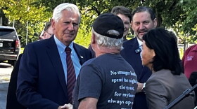 Nassau County Executive Bruce Blakeman, the Republican candidate for New York governor, greets Rick Sabourin of Hamlin on Sept. 18, 2026, in Greece before holding a news conference.