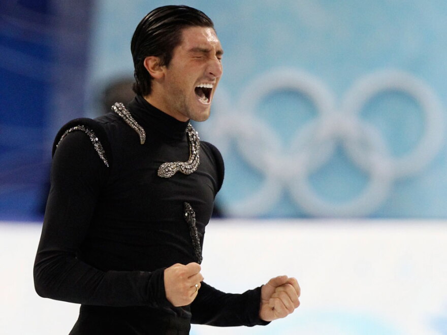 Evan Lysacek reacts after performing his free program during the men's figure skating competition at the Vancouver 2010 Olympics on Thursday.