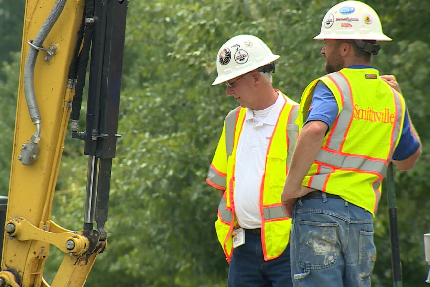 Smithville employees work to install updated fiber internet lines near Ellettsville. (Steve Burns, WFIU/WTIU News)