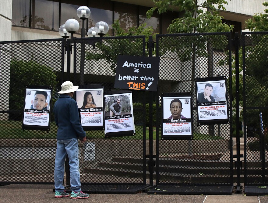The fence at the federal building in Eugene, with memorials to people that protesters say were killed by ICE, June 9, 2026.