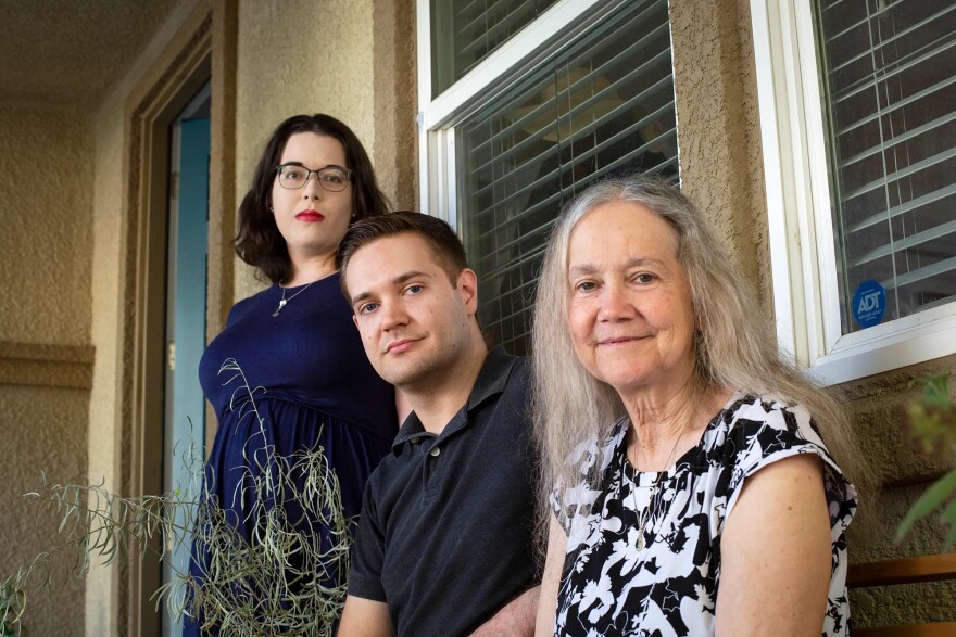 From left, Kelsey McQuaid-Craig, Brandon J. Craig and Mary Craig at their home in Sacramento on Aug. 9, 2022.