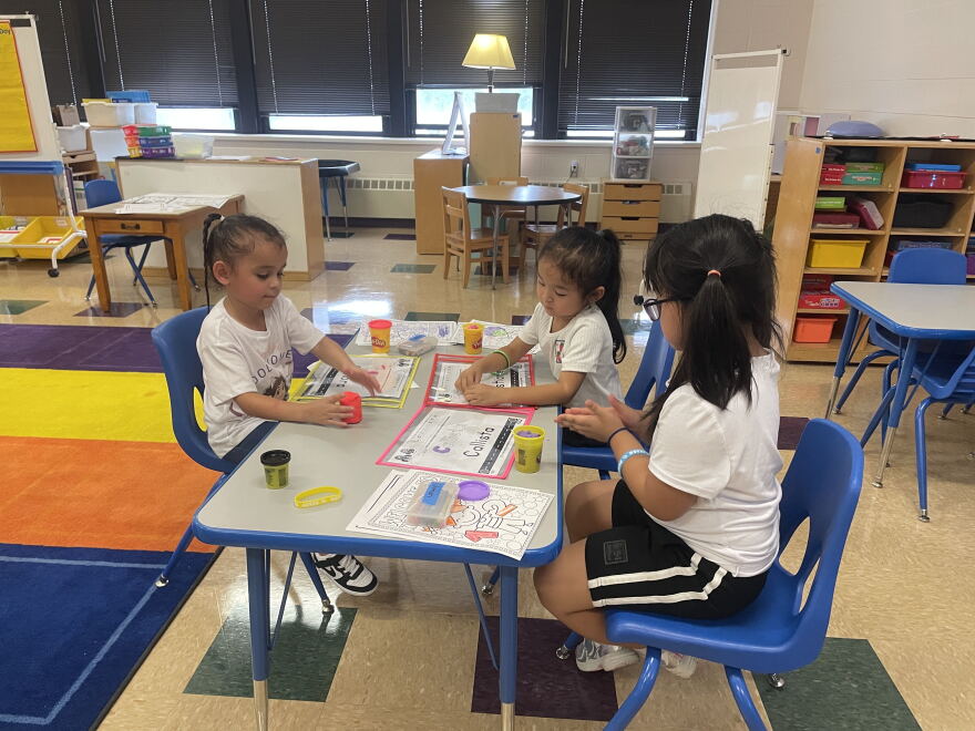 Five-year-old students work in Sara Brown's classroom at Burbank Elementary School in Milwaukee on the first day of school Sept. 1, 2026. The heat index was in the high eighties on the first day.