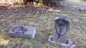 Headstones at Mary E. Smith Memorial Cemetery were toppled and defaced sometime after Dec. 3, according to police.