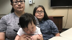 Cheyenne Hoyt, her 7-month-old daughter and 11-year-old son. Hoyt says the father of the children called her from Mexico on Wednesday night to say he'd been deported. 