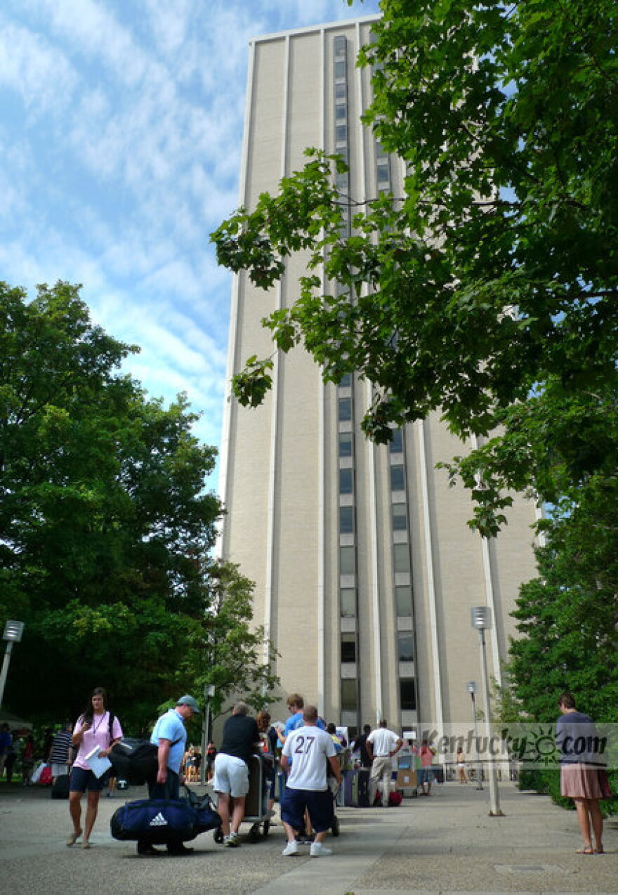 Students, friends, UK staff, and relatives of students waited in line in front of Blanding Tower on Friday, Aug. 19, 2011, during student move-in at the Blanding-Kirwan dorm complex at the University of Kentucky in Lexington.