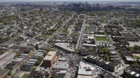 In this April 28, 2015 file photo, police and protesters gather at the intersection of North Avenue and Pennsylvania Avenue, bottom right, in Baltimore, a day after unrest that occurred at the intersection following Freddie Gray's funeral. (Patrick Semansky/AP)