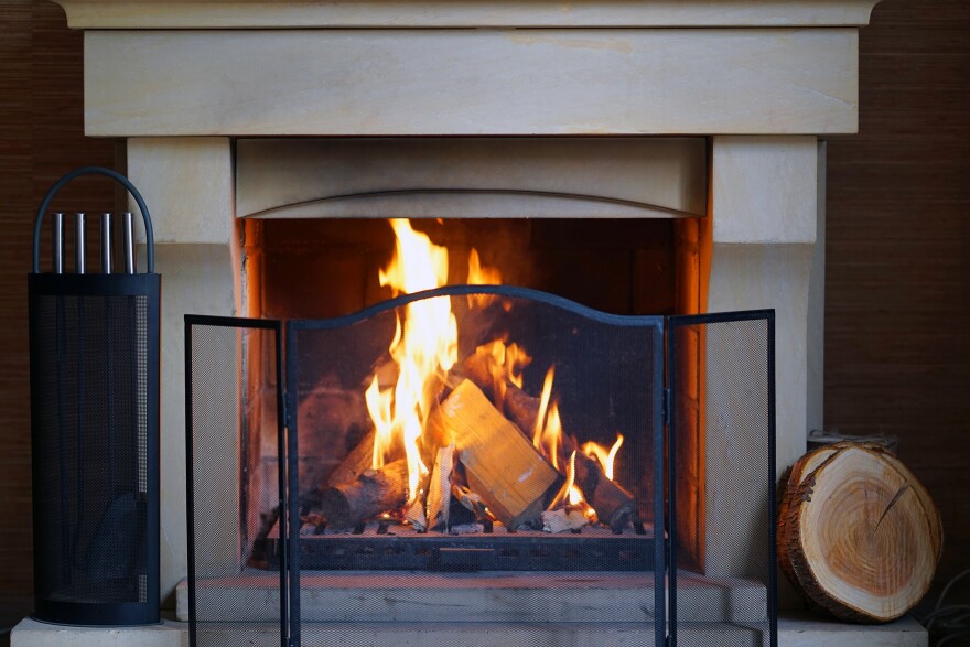 Stock image of a wood-burning fireplace