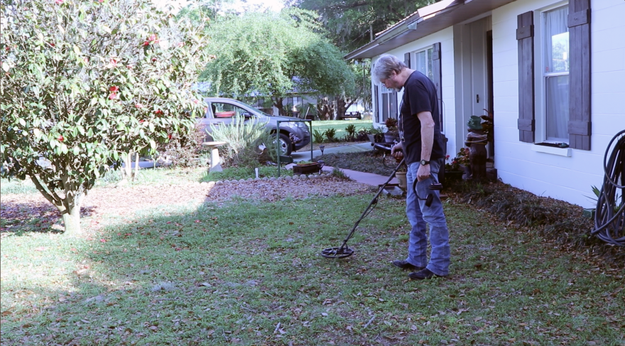 Thom Parham searches for buried historical Florida relics. (Savannah Rude/WUFT News)