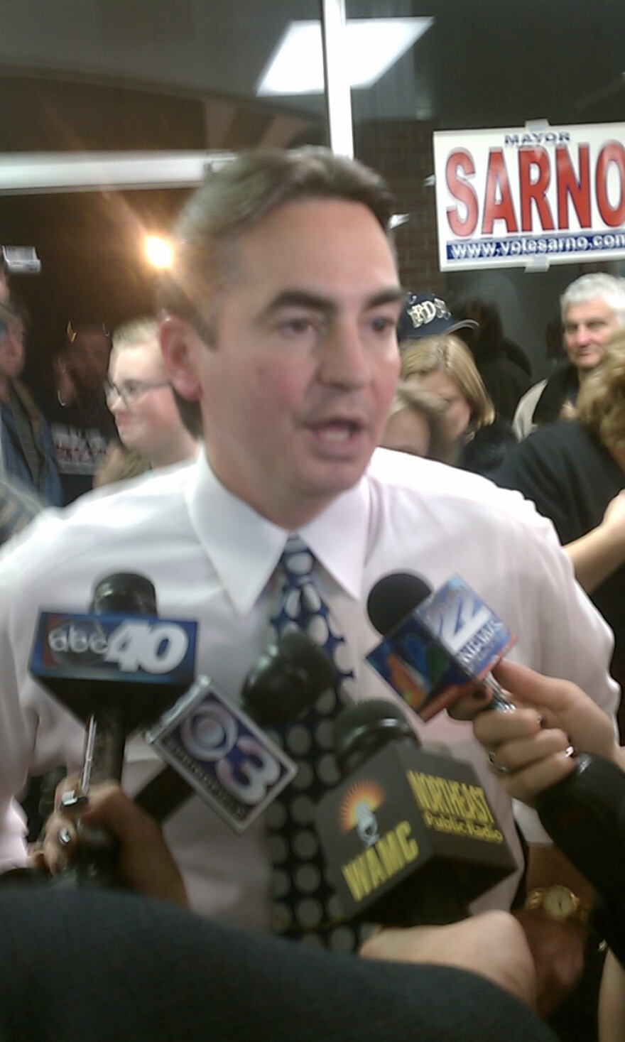 Springfield Mayor Domenic Sarno speaks with reporters at his campaign headquarters where he celebrated reelection
