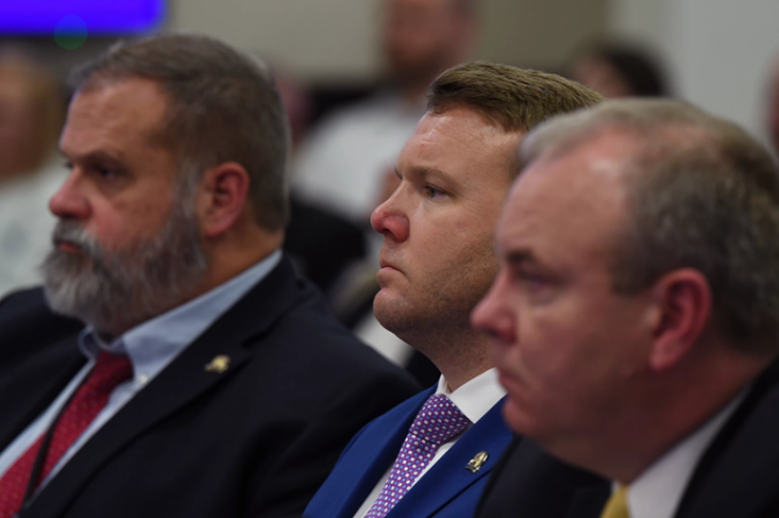 Rep. Jared Bauman, R-Louisville, (center); Rep. John Hodgson, R-Fisherville, (left); and House Majority Whip Jason Nemes, R-Middletown, listen as members of the House Standing Committee on Judiciary ask questions about House Bill 5, legislation related to crime on Thursday, January 18, 2024.