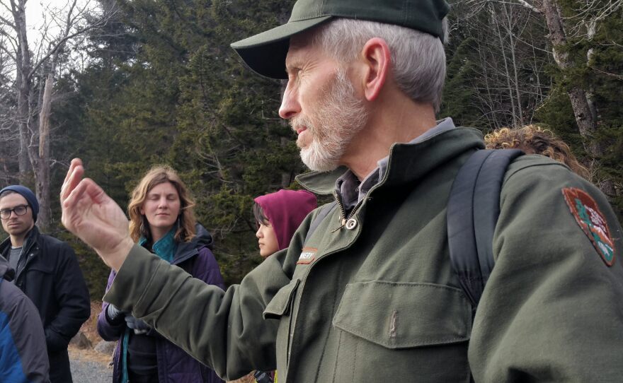 National Park Service biologist Bruce Connery, explains what to look for when tracking otters.