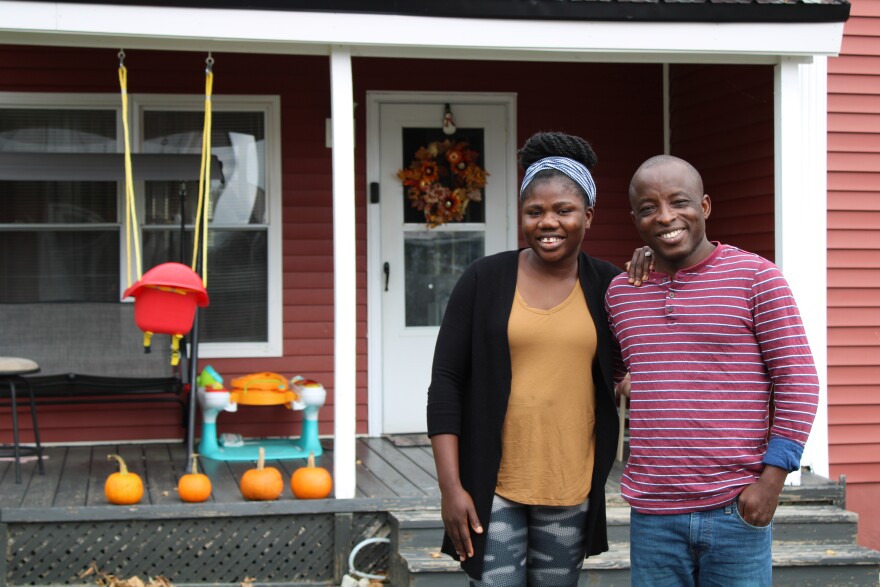 Omotoyosi Gabriel, left, and her husband ID outside their home in Caribou. The Gabriels, originally from Nigeria, have been living in Aroostook County since 2016, and say they appreciate the slower pace of life and the strong relationships they've forged with their neighbors. But Omotoyosi says she's concerned that her five-year-old daughter will struggle with her sense of identity, being the only Black student in her class.