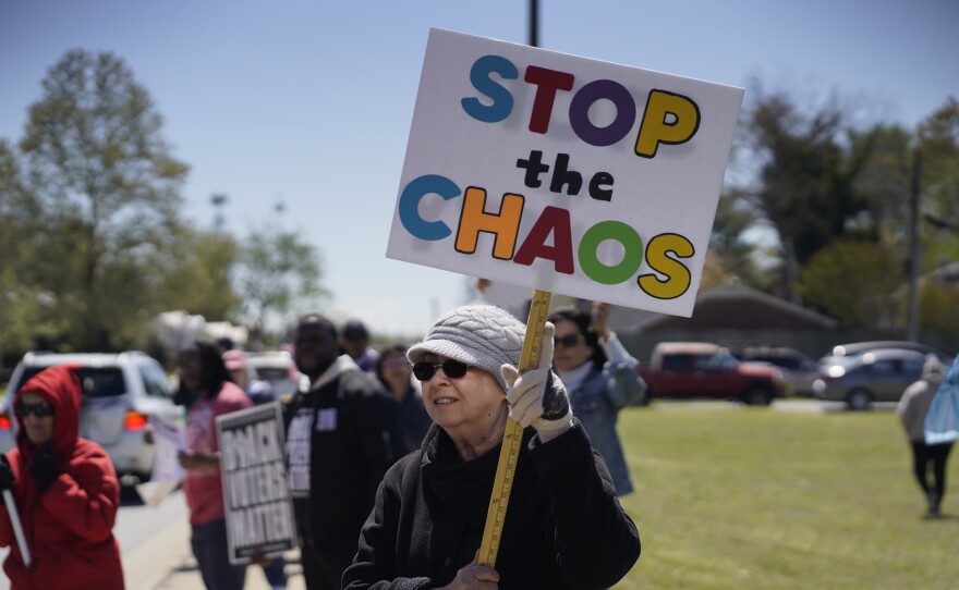 Participants in Greenville joined Saturday’s “No Kings” rally carrying signs protesting the Trump administration.