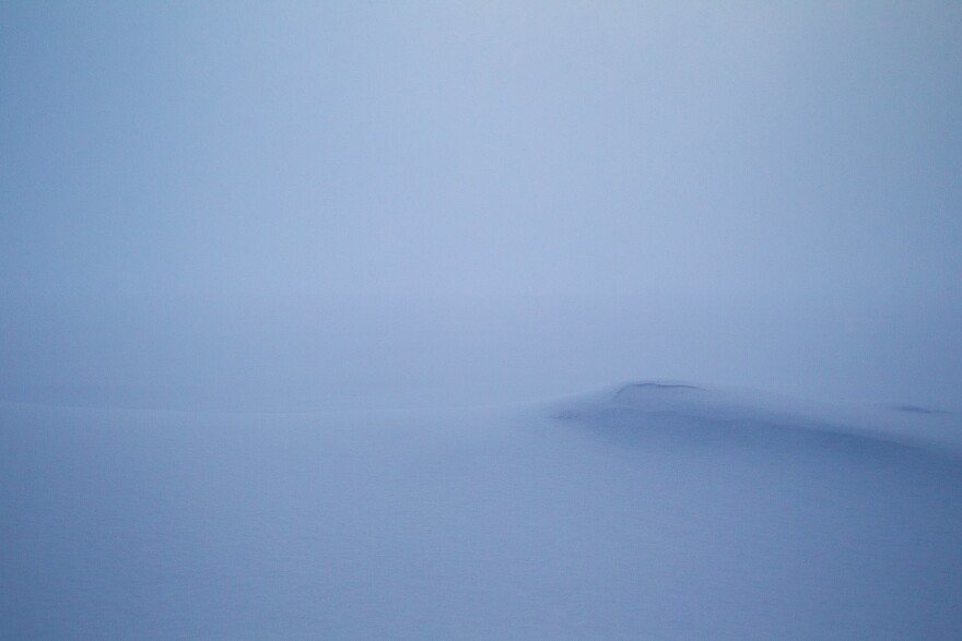 A picture of snow drifts with no sunrise in the background