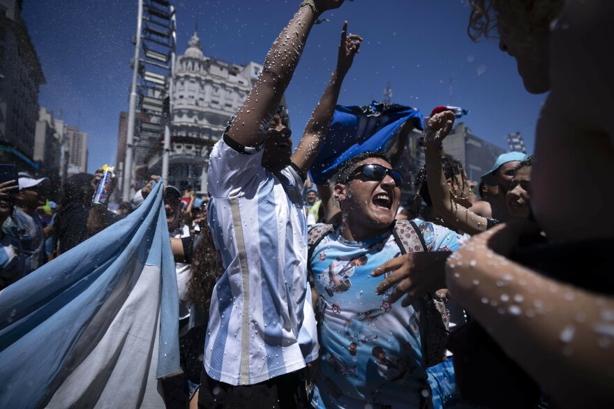 Argentina's fans celebrate their team's 2022 World Cup final win in Buenos Aires on Sunday, Dec. 18.