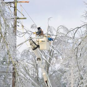 A lineman works to restore power in Oxford, Miss. on Monday, Jan. 26, 2026, following a weekend ice storm.