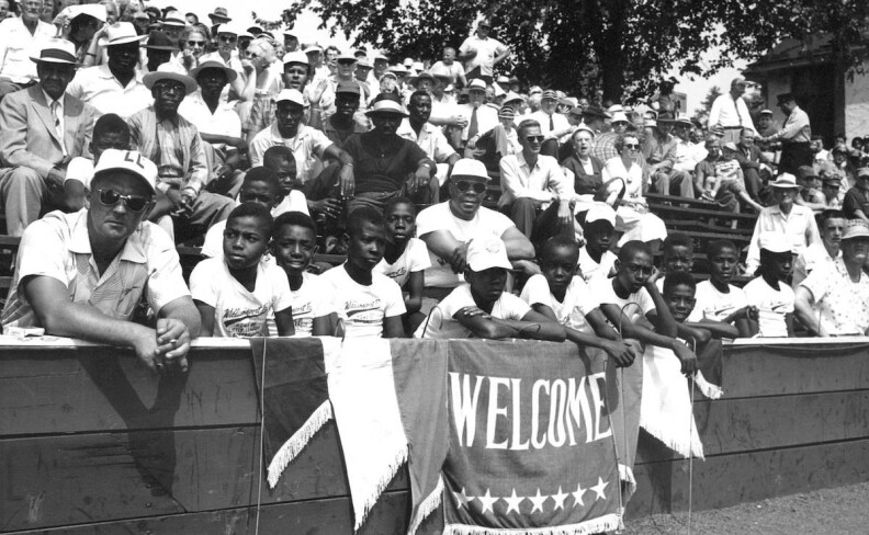 The Cannon Street All-Stars watch from the stands at the 1955 Little League World Series in Williamsport, Pennsylvania.