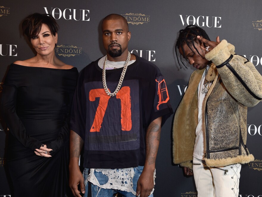 Kris Jenner, Kayne West and Travis Scott at the Vogue 95th Anniversary Party in October of 2015 in Paris.