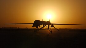 A Predator drone taxis in after a sortie over Iraq in 2004.