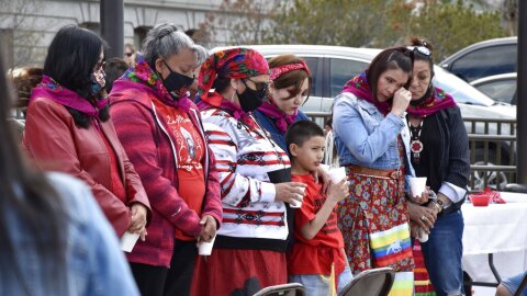 Family members of missing and murdered indigenous women in Montana gather in front of the state Capitol in Helena, Mont., Wednesday, May 5, 2021. They received colorful shawls in a traditional Native American ceremony called "wiping away of tears." From Washington to Indigenous communities across the American Southwest, top government officials, family members and advocates gathered Wednesday as part of a call to action to address the ongoing problem of violence against Indigenous women and children. (AP Photo/Iris Samuels)
