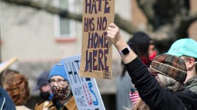 Anti-racist demonstrators gathered on the sidewalk of the DeKalb County courthouse to share resources and help bolster local activists.