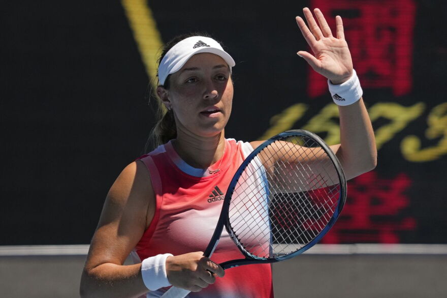 Jessica Pegula in Buffalo Bills colors at her Australian Open tennis match waves to the Melbourne crwod