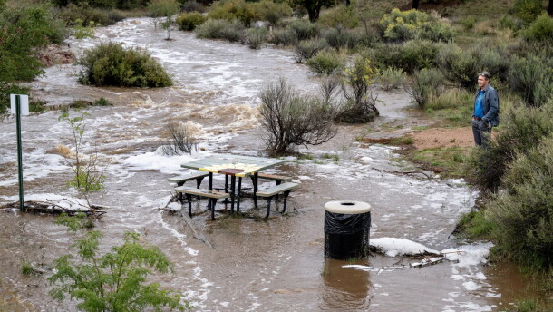 Floodwaters cover a picnic area at the Arroyo Hondo Open Space in Santa Fe on Tuesday, Sept. 26.
