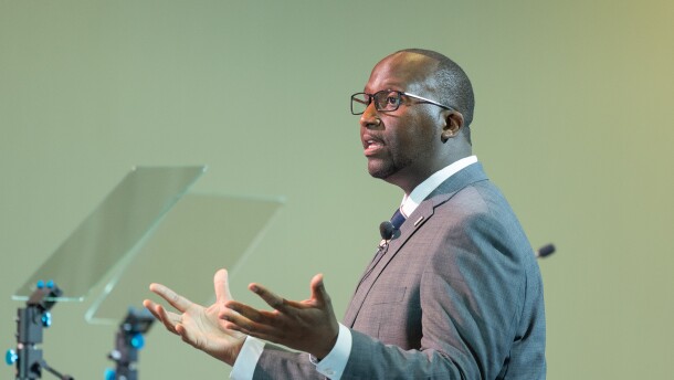 Warren Morgan speaks with his hands held open.