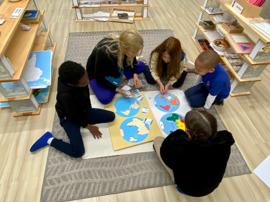 ILIM School students learn to say the names of countries in Spanish using map puzzles.