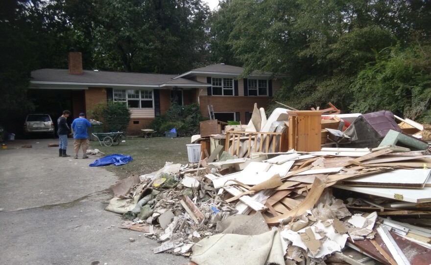Debris outside resident Mike Parker’s home in the Gills Creek neighborhood of Columbia, SC.