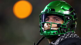 Oregon quarterback Dylan Raiola (8) warms up during the first half of an NCAA college football game against Nebraska, Saturday, Oct. 17, 2026, in Eugene, Ore. (AP Photo/Lydia Ely)