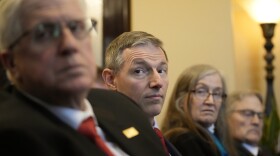 Utah State Sen. Mike Kennedy, second from left, speaks with reporters on the opening day of the Utah Legislative Session at the Utah State Capitol on Tuesday, Jan. 17, 2023, in Salt Lake City. Kennedy, a Republican family doctor sponsoring the Utah proposal, told reporters that it didn't make sense that health care policy related to gender and youth, which is at times irreversible, would be subject to no government oversight. (AP Photo/Rick Bowmer)