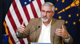 Indiana Gov. Eric Holcomb speaks during a media availability from the Statehouse, Tuesday, Jan. 5, 2021, in Indianapolis.