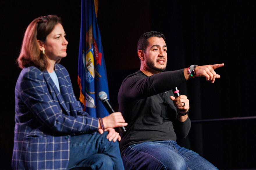 Democratic nominee for U.S. Senate Abdul El-Sayed, right, speaks at a town hall with End Citizens United President Tiffany Muller, left, in Lansing, Mich., on Oct. 9, 2026.