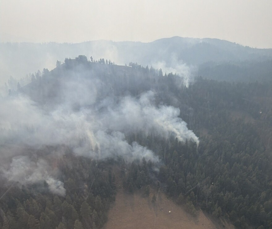 Smoke from Tartar fire burning in timber